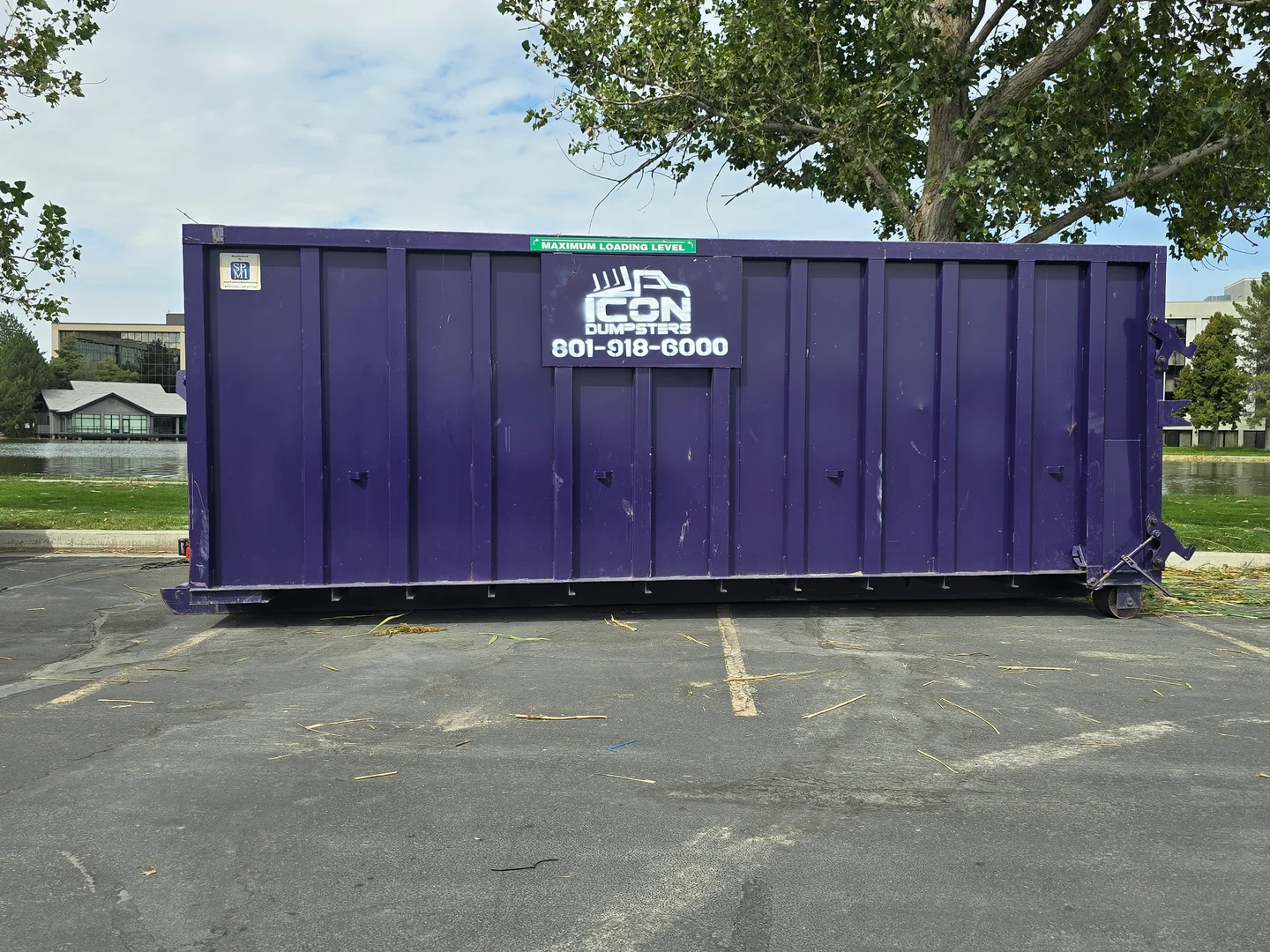 Purple Icon Dumpsters roll-off container for heavy debris